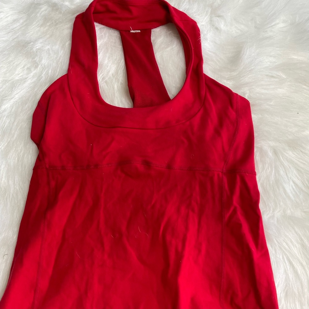 Red scoop neck Lululemon tank top. Super cute mesh on back